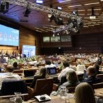 Economists and policymakers attending an economic conference