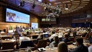 Economists and policymakers attending an economic conference
