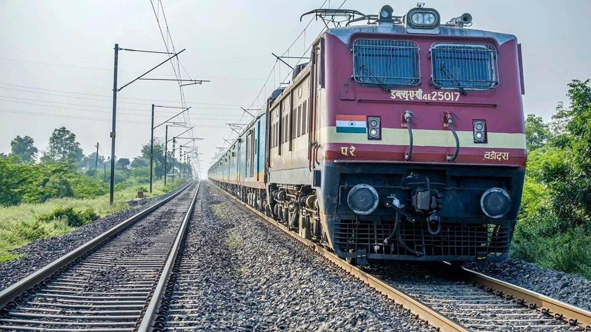 Indian Railways passenger train on railway tracks